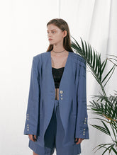 Tailored Linen Blazer with Asymmetric Button Detail and Elongated Silhouette